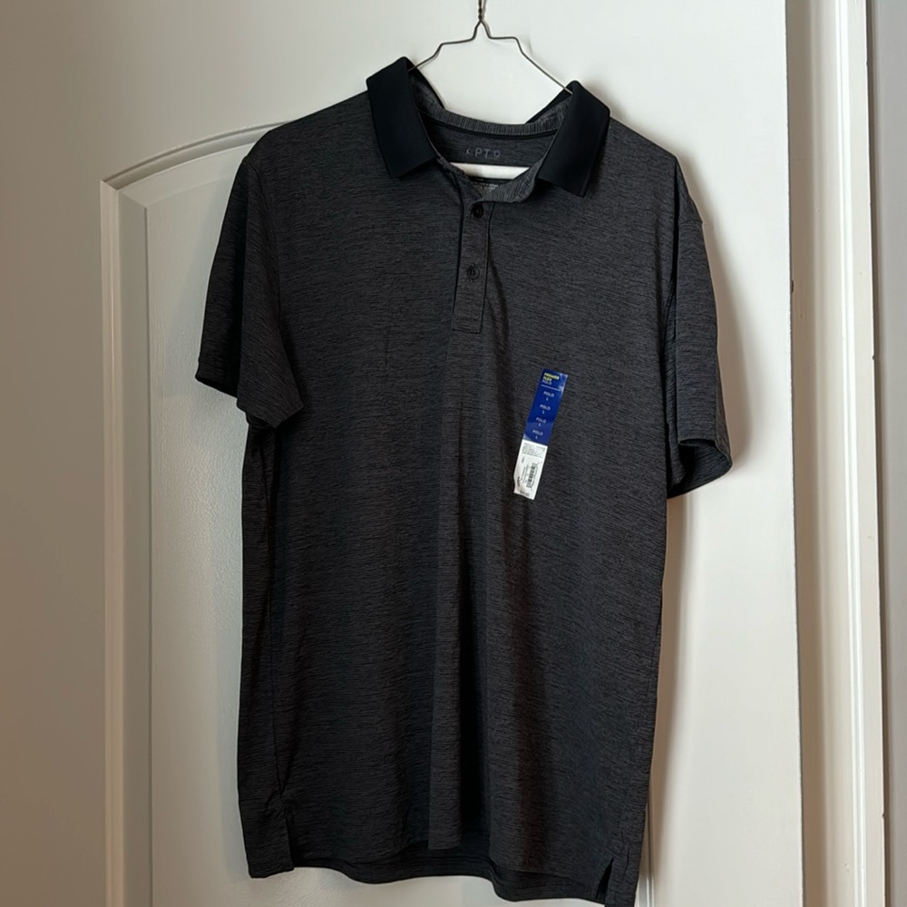 New with Tag. Men’s performance polo. Size L.